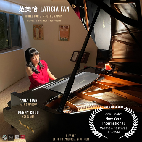 A Taiwanese woman plays piano by candlelight.