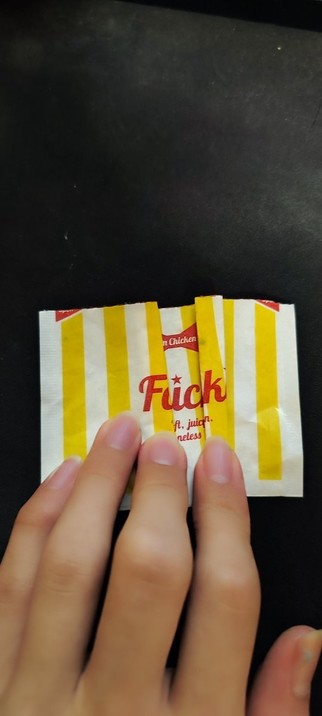 A Famichiki wrapper that some idiot has folded so that it says 