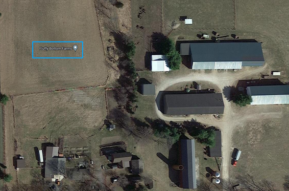 A Google Maps satellite view of a large farm and out buildings.
There is a map pin which reads 
