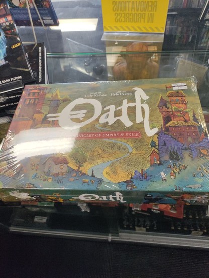 A pre-owned copy of the board game Oath in shrink wrap.