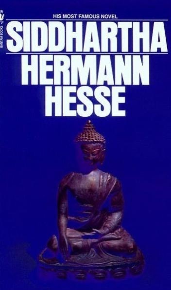 Cover of Siddhartha by Herman Hesse. Cover art includes an image of a Buddha statue on a deep blue background 