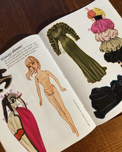 Paper doll in a magazine 