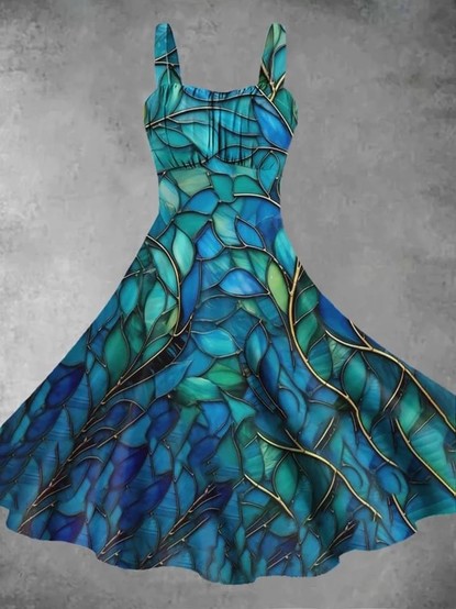 A dress made of fabric looking like pieces of blue and green stitched together across thick black lines 