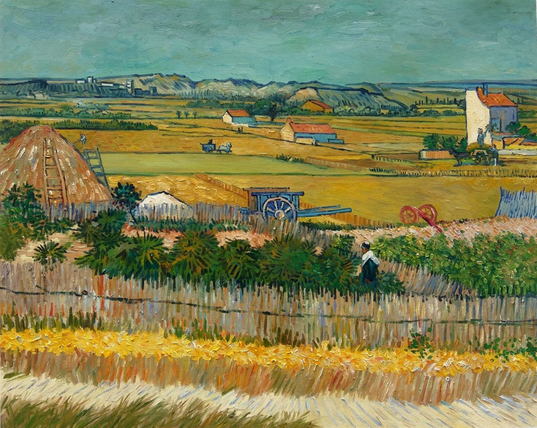 A Post-Impressionist landscape. We have a sweeping view of multiple farm fields, a real view near Arles. The land is a patchwork of farm fields with different people working. In the foreground a worker is dealing with some plants, while further back we see carts, horses, various laborers, a haystack, and assorted buildings and houses. In the distance we can see a town, and beyond that, the Alpilles mountains.